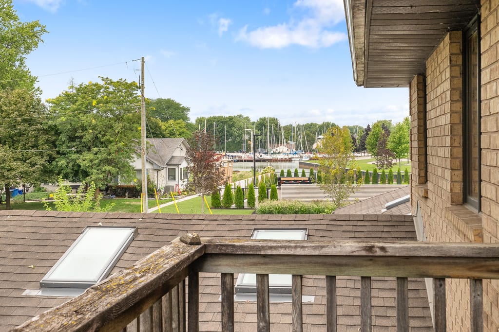 View from the second-storey terrace looking out over the marina and moored sailboats