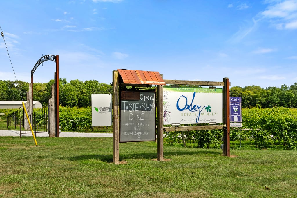 Oxley Estate Winery entrance sign on County Road 50 opposite the property