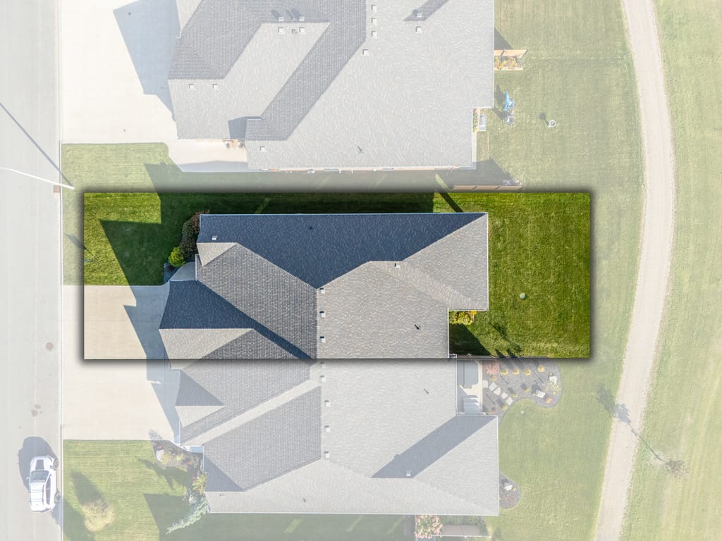 Overhead aerial with the property outlined, showing the house, the backyard, and the trail beyond it